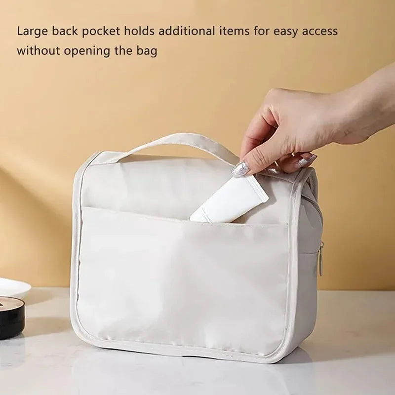 Trousse de toilette à suspendre - poche arrière zippée