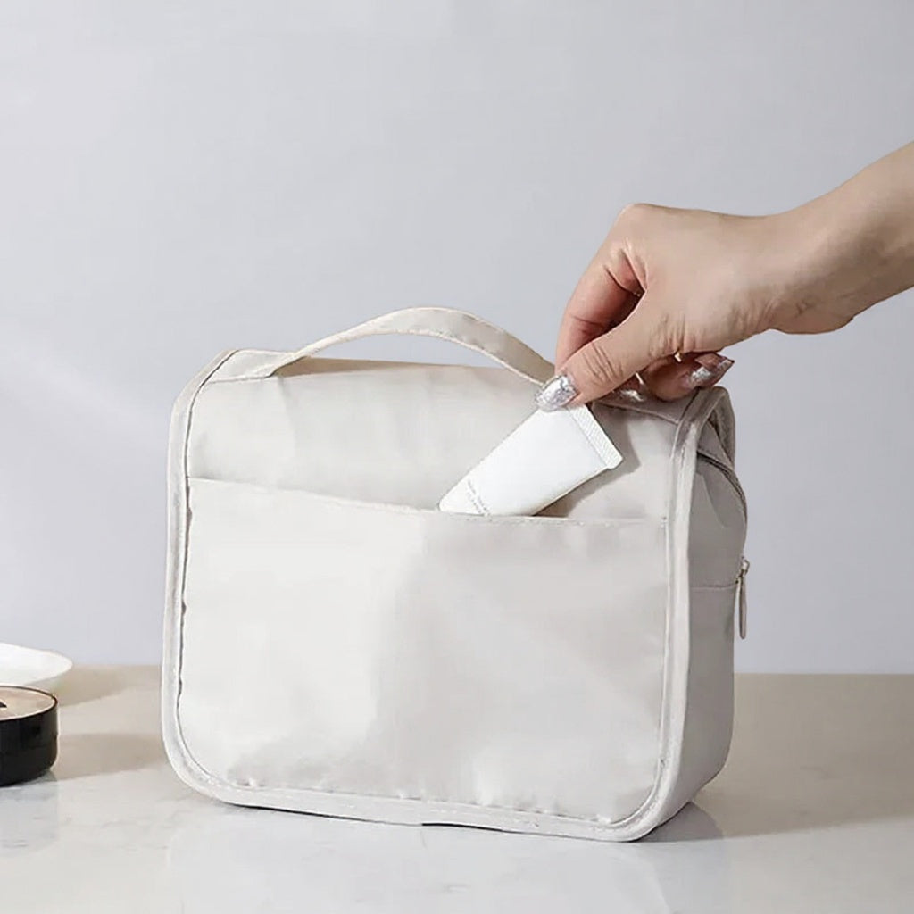 Trousse de toilette à suspendre - poche arrière zippée